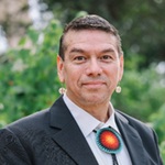 Dr. Mark Standing Eagle Baez